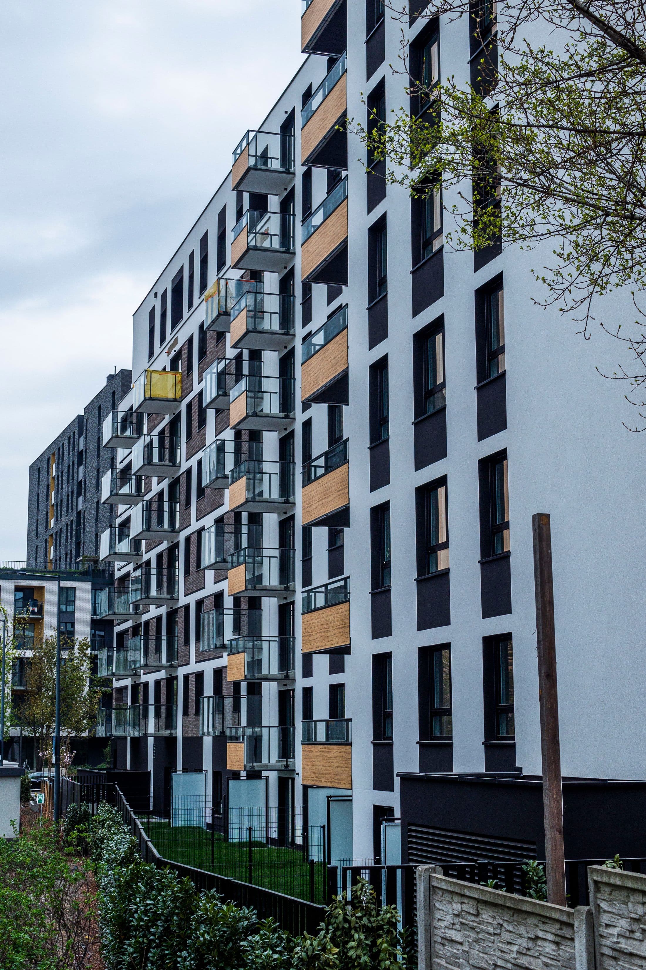 Exterior of a modern managed apartment development with balconies